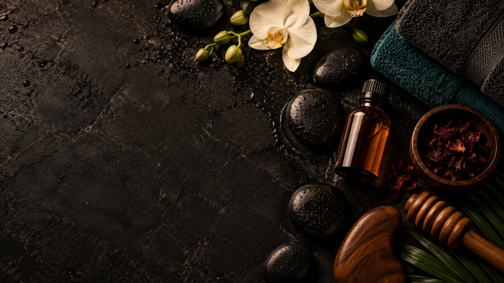 Black spa stones and botanical oils